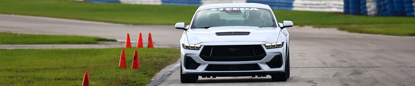 White 2024 Ford Mustang GT HPDE build at speed on track at Sebring International Raceway - Stage 0