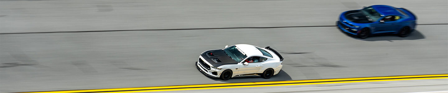 White 2024 Ford Mustang GT HPDE build at speed on track - Stage 2