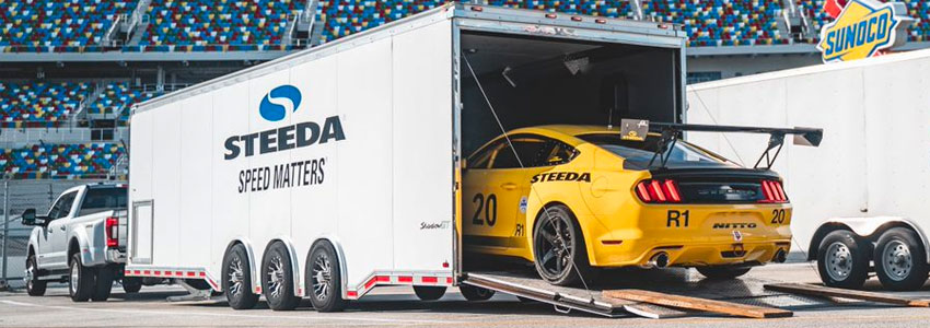 Steeda's Yellow #20 Unloading at Daytona International Speedway