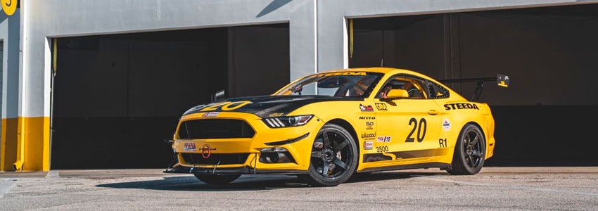 Steeda's Yellow #20 in the pits at Daytona International Speedway