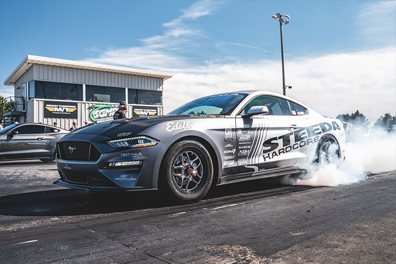 The Steeda Silver Bullet drag car preparing for one of its vastly-faster sprints down the strip thanks to the Edelbrock supercharger.